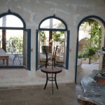 Inside the front entry, looking out at the main terrace.