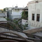 The neighborhood, including an old cart perched on one of our terraces.