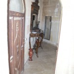 Through the front door.